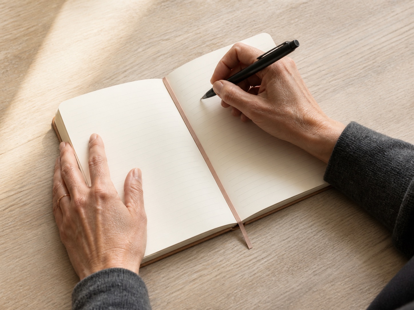 A woman preparing notes in a notebook